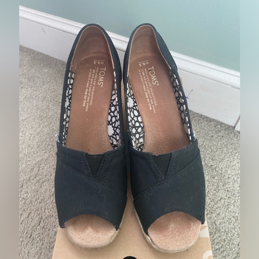 Toms Wedge shoes.  Size 6.5 in black canvas.  Excellent condition.